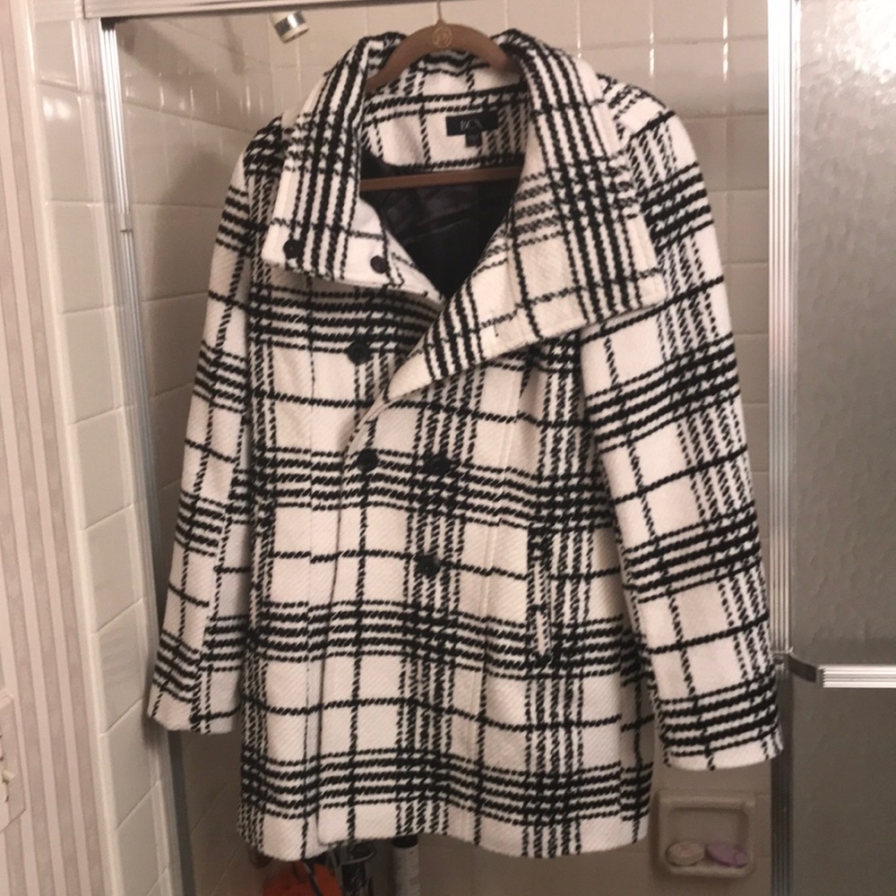 A darling black and white jacket. It’s just too small for me.